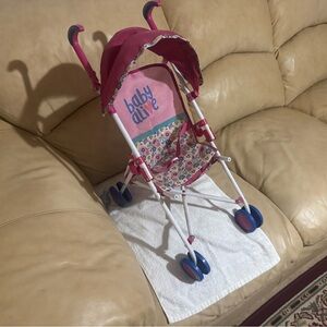 Pink and Blue Toy Stroller